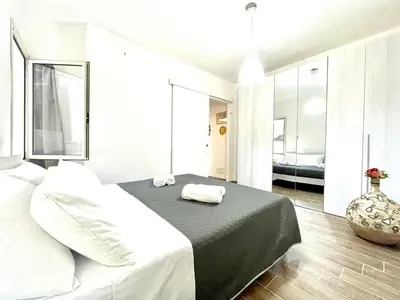 Letto o letti in una camera di Teddy House Apartments