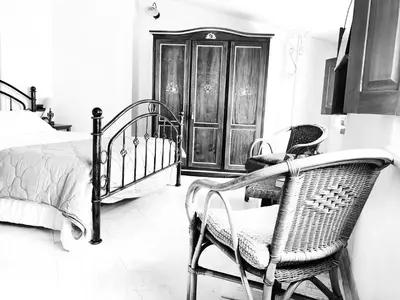 Letto o letti in una camera di Prestige Room- Salotto Interno- Frigobar- Esperienze Esclusive nel Territorio - Tutti i confort