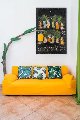 Area soggiorno di Nora Guesthouse Rooms and Villas