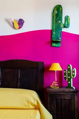 Letto o letti in una camera di Nora Guesthouse Rooms and Villas