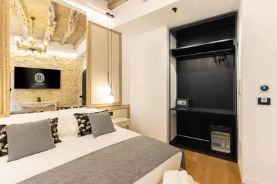 Letto o letti in una camera di Pedra Bianca Luxury Rooms
