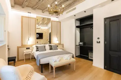 Letto o letti in una camera di Pedra Bianca Luxury Rooms