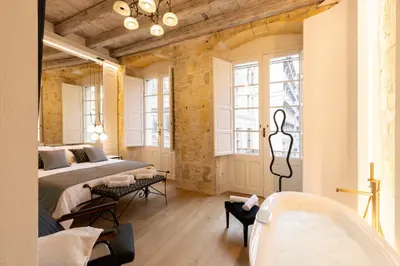 Letto o letti in una camera di Pedra Bianca Luxury Rooms