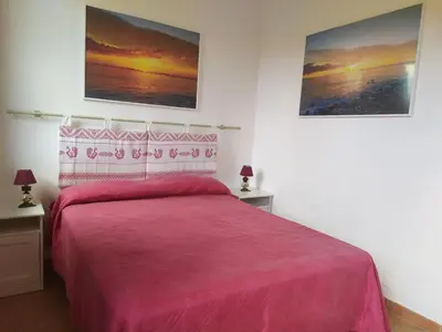 Letto o letti in una camera di Ajò Faci a Mari
