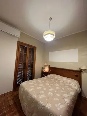 Letto o letti in una camera di Il Glicine
