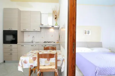 Letto o letti in una camera di Appartamento Mariolu 1