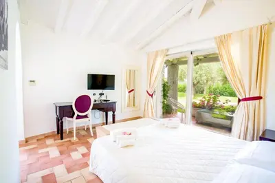 Letto o letti in una camera di Nicolaus Prime Villas Resort