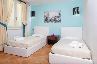 Letto o letti in una camera di Nicolaus Prime Villas Resort