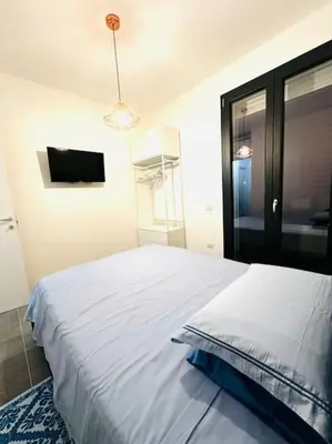 Letto o letti in una camera di Blue Orchid Apartment, IUN S8460