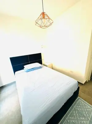 Letto o letti in una camera di Blue Orchid Apartment, IUN S8460