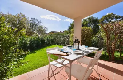 Giardino di Residence in Costa Rei just 450 meters from the beach, apartments with air conditioning and outdoor private area