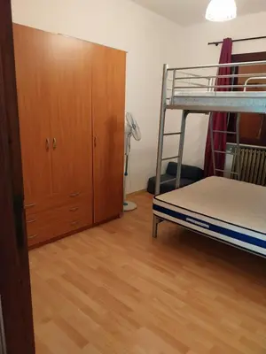 Letto o letti in una camera di CAR' MARE d'ANTIOCO