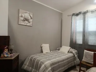 Letto o letti in una camera di L'attico di Giorgio