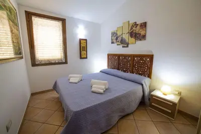 Letto o letti in una camera di Bilocale Apartments Seaside