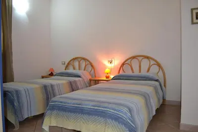 Letto o letti in una camera di Trilocale Apartments Seaside