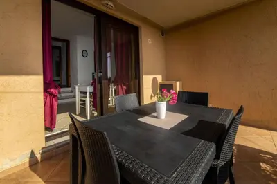 Area soggiorno di Trilocale Apartments Seaside