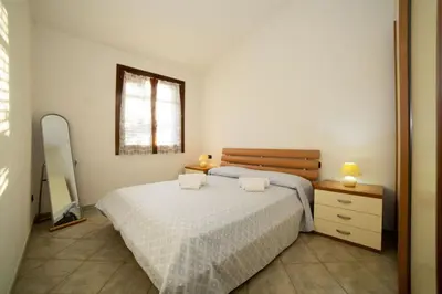 Letto o letti in una camera di Villino Trilocale Apartments Seaside