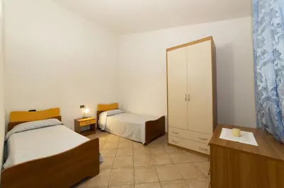 Letto o letti in una camera di Villino Trilocale Apartments Seaside