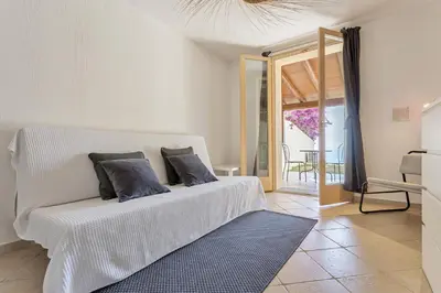 Letto o letti in una camera di Casa Alba