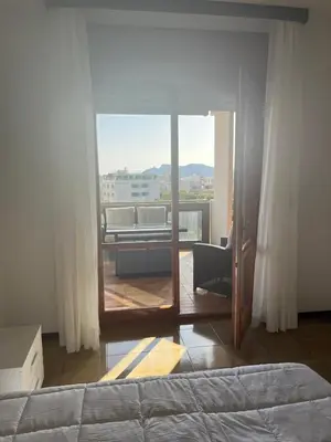 Letto o letti in una camera di Centralissimo zona residenziale