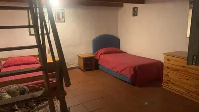 Letto o letti in una camera di Villa Lidia