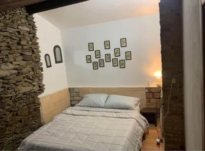 Letto o letti in una camera di Villa Lidia