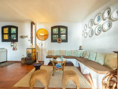 Area soggiorno di Holiday Home Capo Boi by Interhome