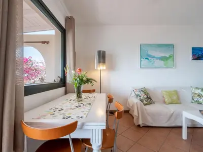 Area soggiorno di Holiday Home del Mare dipinto by Interhome