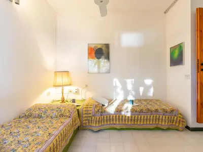 Letto o letti in una camera di Holiday Home Capo Boi by Interhome