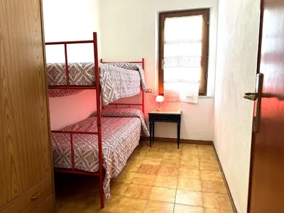 Letto o letti in una camera di Casa Flores