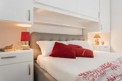 Letto o letti in una camera di Casa Ginepro