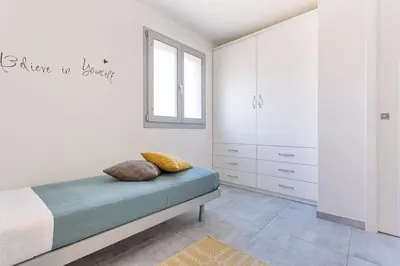 Letto o letti in una camera di Casa Ginepro