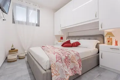 Letto o letti in una camera di Casa Ginepro