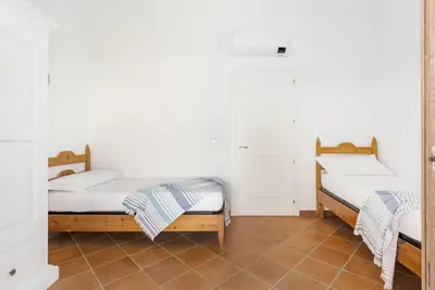Letto o letti in una camera di Casa Lulù