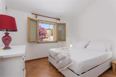 Letto o letti in una camera di Casa Lulù