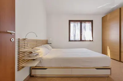 Letto o letti in una camera di Casa Luna