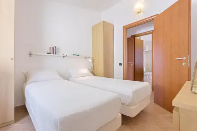 Letto o letti in una camera di Casa Luna