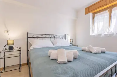 Letto o letti in una camera di Casa Marea