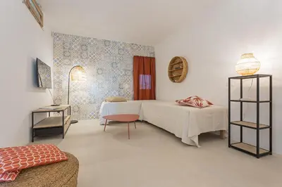Letto o letti in una camera di C'est la vue