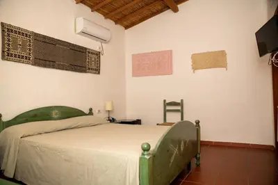 Letto o letti in una camera di Agriturismo Santa Lucia