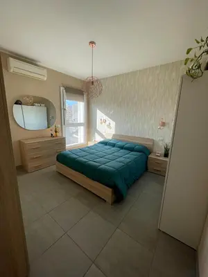Letto o letti in una camera di Urban Jungle Studio