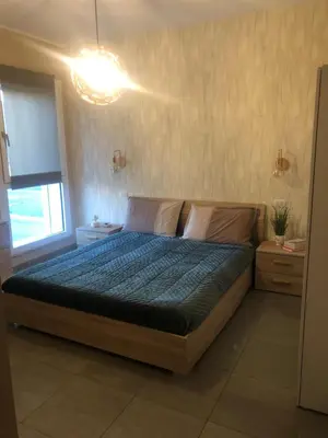 Letto o letti in una camera di Urban Jungle Studio