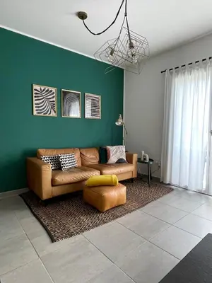 Area soggiorno di Urban Jungle Studio