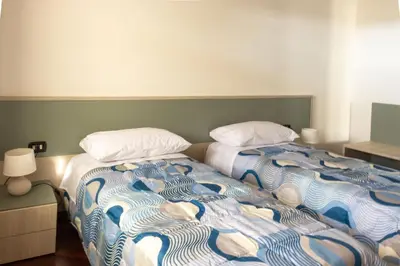 Letto o letti in una camera di Villa Carlotta
