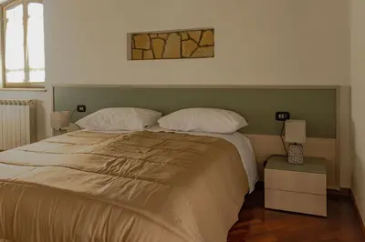 Letto o letti in una camera di Villa Carlotta