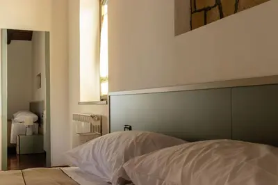 Letto o letti in una camera di Villa Carlotta