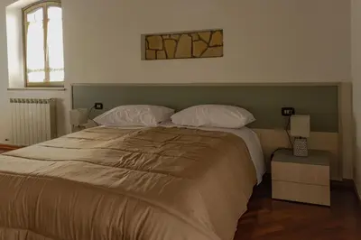 Letto o letti in una camera di Villa Carlotta