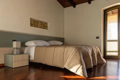 Letto o letti in una camera di Villa Carlotta