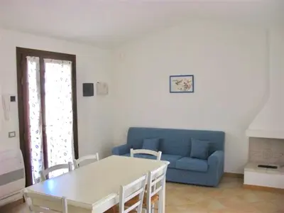 Area soggiorno di Villas with shared pool in Costa Rei just 500 meters from the sea