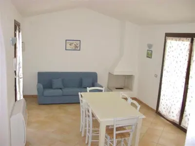Area soggiorno di Villas with shared pool in Costa Rei just 500 meters from the sea
